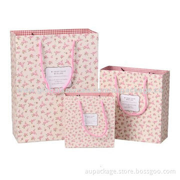 Paper bag with string, quality matte white cardboard and covered